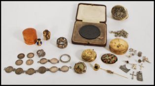 A collection of 20th century jewellery items to include a yellow metal Citron international pocket