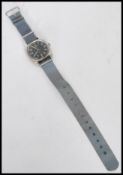 A vintage 20th century Hamilton military / pilots watch having a black face with luminous dial and
