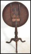 A George III mahogany tilt-top circular occasional