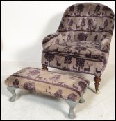 A late 19th century Victorian tub chair on turned wooden feet with ceramic casters having a button