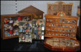 A collection of Colour Box Miniature bears in wooden display cases, some having glazed fronts,
