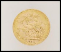 A vintage early 20th century full sovereign gold coin dated 1921.