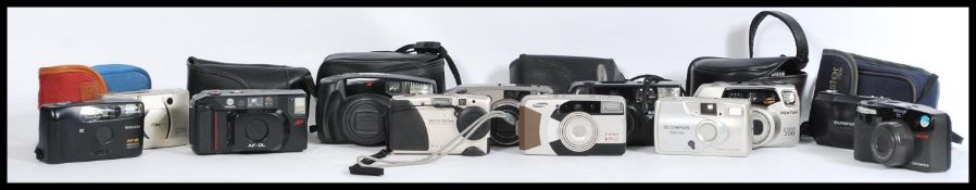 A collection of 20th century film cameras to include a Nikon Lite Touch Zoom 70Ws, a Minolta af-