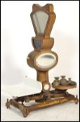 A large set of early to mid century Industrial shop enamel gilt metal and mirror glass grocers