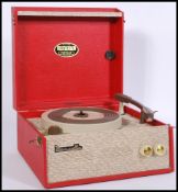 Dansette 'Popular' 1950s portable record player with a beige textured panel to the front and red
