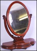 A 19th Century Victorian flame mahogany swing / to