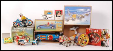 COLLECTION OF ASSORTED TIN PLATE CLOCKWORK TOYS