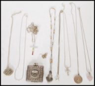 A selection of silver jewellery to include silver necklace chains, pendants and crucifixes and a