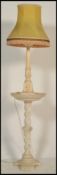 A mid century alabaster plant stand having barley twist shaped column together with a matched