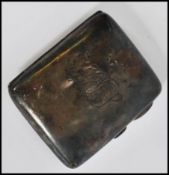 An Edwardian silver hallmarked cigarette case with monogram to the front bearing hallmarks for