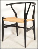 After Hans Wegner - CH24 Wishbone Chair - A retro vintage style chair / armchair comprising of a