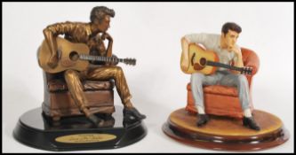 A limited edition hand painted ' Love Me Tender ' musical Elvis Presley figurine by Franklin Mint