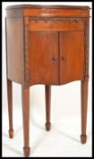 A vintage 20th century Jtonia John Barker Gramophone heart form cabinet raised on four tapering