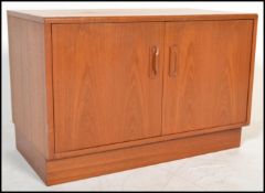 A vintage / retro 20th Century G-Plan low teak wood sideboard / entertainment unit, two cupboard