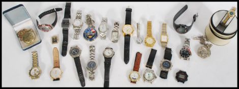 A large collection of vintage and contemporary watches to include digital, designer, Sekonda,