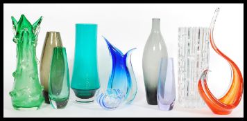 A collection of 10x retro 20th century coloured studio art glass vases. The vases being Scandinavian