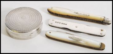 A selection of early to mid 20th century silver hallmarked folding fruit knives, one marked John