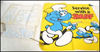 A large 20th century vintage advertising poster for national petrol from 1978 featuring Smurf's
