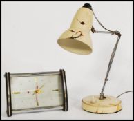 A vintage retro 20th century Diamond clock along with a vintage anglepoise type desk lamp on