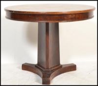 A Victorian 19th century mahogany centre table - coffee occasional table. Raised on a trefoil base