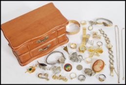 A collection of costume jewellery to include rings, watches, silver rings, brooches, two 9ct gold
