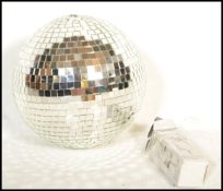 A retro 20th Century hanging Disco mirror ball, hook to the top for hanging, constructed from square
