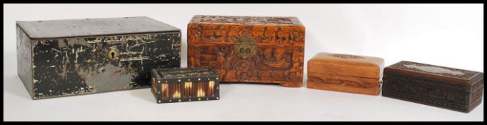 A selection of wooden boxes to include a trinket box with inlaid porcupine quills having a sliding