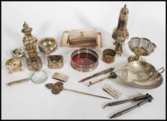 A group of silver plated and silver hallmarked wares to include two hallmarked napkin rings, and a