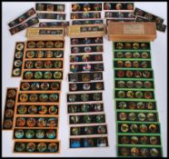 A collection of 19th century Victorian hand coloured magic lantern slides to include mostly