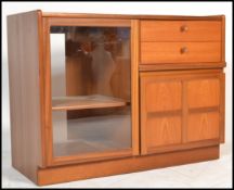A retro 20th Century teak wood Nathan entertainment music cabinet / sideboard, glazed door below