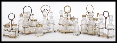 A collection of cut glass and metal cruet condiment sets some being silver plated with central