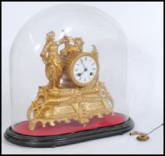 A 19th century French 8 day mantel clock having cylinder 8 day movement in gilt figural body being