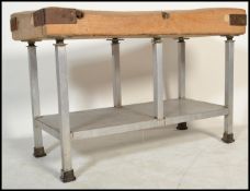 A large 20th century industrial wooden, believed maple butchers block with parquetry inset blocks