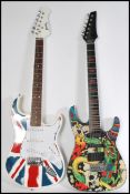 Two vintage electric guitars to include a Rockster Chinese dragon guitar and a Jaxville Union Jack
