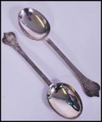 A pair of  Britannia standard silver anointing spoons by Thomas Bradbury & Sons, London hallmarks,
