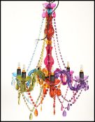 A retro 20th Century multi coloured hanging six sconce chandelier, of traditional design.