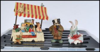 A selection of resin collectible ornaments to include beau bears including Charlie Chaplin bear,
