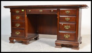 A 20th Century reproduction mahogany twin pedestal