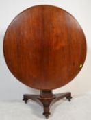 A 19th Century mahogany tilt-top breakfast table w