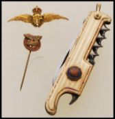 A 9ct gold hallmarked RAF sweethearts brooch with pin together with a yellow metal and enamel '