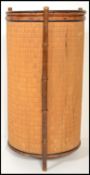A 19th century Victorian faux bamboo laundry basket of cylindrical form. Measures 75 cm x 39 cm