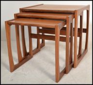 A G-Plan retro teak wood 1970's graduating nest of tables in the Quadrille pattern. The tables