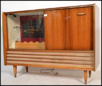 A vintage 20th Century walnut cased Mozart radiogram / bar in fantastic condition, fitted valve