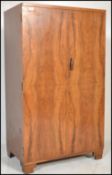 A vintage 20th Century Art Deco bachelors robe / wardrobe, to full length doors opening to reveal