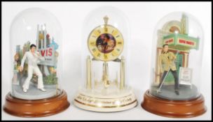 A collection of Franklin Mint Elvis Presley domed sculptural collectibles, to include All Shook