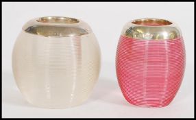 Two Victorian / Edwardian hallmarked silver rim ovoid glass match strikes, one of clear glass and