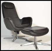 A contemporary black leather swivel reclining easy / lounge chair together with matching