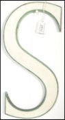 A vintage early to mid 20th Century Shop front bronze advertising letter S, the letter cast in