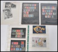 HITLER - Range of vintage stamps and postcards featuring him and Swastikas.