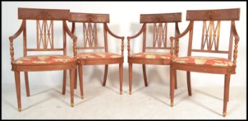 A set of 4 biedermeier empire style dining chairs with turned legs gilded embellishments with
